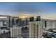 Expansive daytime city view of Las Vegas, highlighted by luxury hotel towers against a mountain backdrop at 145 E Harmon Ave # 3807, Las Vegas, NV 89109