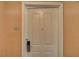 View of a secure white front door with a digital lock and unit number at 145 E Harmon Ave # 3807, Las Vegas, NV 89109