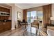 Bright living room features a seating area and a dining space with city views from large sliding glass doors at 145 E Harmon Ave # 3807, Las Vegas, NV 89109