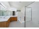 Spacious bathroom with double sinks, soaking tub, and a glass-enclosed shower at 190 Channel Dr, Henderson, NV 89002