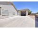 Spacious driveway leads to a large garage featuring an open door to allow for ample natural lighting at 190 Channel Dr, Henderson, NV 89002