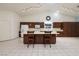 Spacious kitchen features a breakfast bar, tile flooring, stainless steel appliances, and recessed lighting at 190 Channel Dr, Henderson, NV 89002