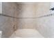 Bathroom featuring a tub with ceramic tile surround and shower fixture at 2046 Waverly Cir, Henderson, NV 89014