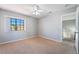 Bedroom with neutral walls, carpet, ceiling fan and natural light at 2046 Waverly Cir, Henderson, NV 89014
