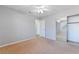 Bedroom featuring neutral walls, carpet, and closet with sliding mirror doors at 2046 Waverly Cir, Henderson, NV 89014