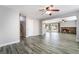 The spacious living room features wood-look flooring, a cozy fireplace, and ample natural light at 2046 Waverly Cir, Henderson, NV 89014