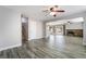 The spacious living room features wood-look flooring, a cozy fireplace, and ample natural light at 2046 Waverly Cir, Henderson, NV 89014