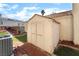Functional backyard shed for extra storage, adjacent to a brick-lined walkway and lush lawn at 2046 Waverly Cir, Henderson, NV 89014