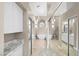 Ensuite bathroom featuring marble countertops and a large soaking tub at 2529 Seascape Dr, Las Vegas, NV 89128
