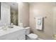 Clean bathroom featuring white vanity, tile shower, and neutral color scheme at 2529 Seascape Dr, Las Vegas, NV 89128
