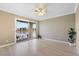 Bright bedroom with view of lake from attached balcony, decorative plant at 2529 Seascape Dr, Las Vegas, NV 89128