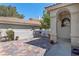 Inviting front entrance with decorative brickwork and a cozy seating area at 2529 Seascape Dr, Las Vegas, NV 89128
