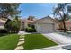 Charming single-story home with a well-manicured lawn and inviting curb appeal at 2529 Seascape Dr, Las Vegas, NV 89128