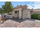 Welcoming home exterior with an arched entryway and a nicely designed brick courtyard at 2529 Seascape Dr, Las Vegas, NV 89128