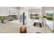 Modern kitchen with white countertops, updated appliances, and views of the lake at 2529 Seascape Dr, Las Vegas, NV 89128