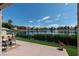 Relaxing patio overlooking the serene lake, a perfect spot for morning coffee or evening relaxation at 2529 Seascape Dr, Las Vegas, NV 89128