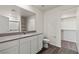 Bathroom with vanity and walk-in closet at 2611 Freya Valley St, Las Vegas, NV 89156