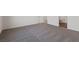 Bedroom featuring neutral carpeting and an attached bathroom at 2611 Freya Valley St, Las Vegas, NV 89156
