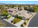Beautiful aerial view of the property showcasing the lush landscaping and solar panels, offering a sustainable living at 308 Kingsclear Ct, Las Vegas, NV 89145