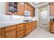 Bright kitchen features granite countertops, tiled backsplash and ample storage at 308 Kingsclear Ct, Las Vegas, NV 89145