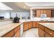 Well-equipped kitchen with granite countertops and bright cabinetry at 308 Kingsclear Ct, Las Vegas, NV 89145