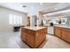 Open-concept kitchen with center island and modern appliances at 308 Kingsclear Ct, Las Vegas, NV 89145