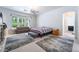 Serene main bedroom with large windows and comfortable seating at 308 Kingsclear Ct, Las Vegas, NV 89145