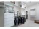 Spacious walk-in closet with built-in shelving, drawers, and racks for optimal organization at 308 Kingsclear Ct, Las Vegas, NV 89145