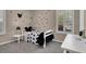 Charming bedroom features a bed, a window with shutters, and themed décor at 3141 Monet Sunrise Ave, Henderson, NV 89044