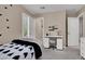 Bright bedroom featuring a white desk and a comfortable sleeping space at 3141 Monet Sunrise Ave, Henderson, NV 89044
