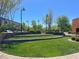 Inviting community park featuring green spaces and landscaping, perfect for outdoor activities and relaxation at 3141 Monet Sunrise Ave, Henderson, NV 89044