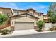 Charming two-story home with a well-maintained front yard, attached garage, and inviting curb appeal at 3141 Monet Sunrise Ave, Henderson, NV 89044