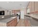 Bright kitchen features wooden cabinets and countertops, stainless steel appliances, and a gas range at 3141 Monet Sunrise Ave, Henderson, NV 89044