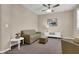 Cozy living room featuring neutral decor and a ceiling fan at 3141 Monet Sunrise Ave, Henderson, NV 89044