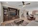 Bright and airy living space with built-in shelves and staircase at 3141 Monet Sunrise Ave, Henderson, NV 89044