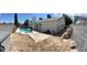 Wide angle shot of pool and the back of the house inside a fenced yard at 3144 Downing Pl, Las Vegas, NV 89121