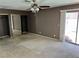 Bedroom with ceiling fan, carpet, and sliding glass doors at 3144 Downing Pl, Las Vegas, NV 89121