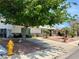 Charming single-story home featuring desert landscaping and a well-maintained front yard at 3144 Downing Pl, Las Vegas, NV 89121