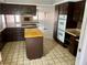 Well-equipped kitchen featuring ample cabinetry and a large island for meal preparation at 3144 Downing Pl, Las Vegas, NV 89121