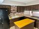 Efficient kitchen with plenty of cabinets and a practical layout for cooking and dining at 3144 Downing Pl, Las Vegas, NV 89121
