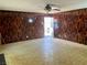 Living room with paneled walls and patterned flooring at 3144 Downing Pl, Las Vegas, NV 89121