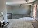 Spacious living room featuring neutral paint, a ceiling fan, and tiled entryway at 3144 Downing Pl, Las Vegas, NV 89121