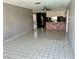 Open-concept living space with tile floors and great flow for easy entertaining at 3144 Downing Pl, Las Vegas, NV 89121