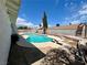 Backyard pool with diving board and concrete surround at 3144 Downing Pl, Las Vegas, NV 89121