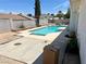 Backyard pool with concrete surround and block wall at 3144 Downing Pl, Las Vegas, NV 89121