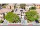 Aerial shot of a home with solar panels, lush landscaping, and a long driveway at 3367 Popcorn Flower St, Las Vegas, NV 89117