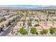 Aerial view of a residential neighborhood with lush trees and well-maintained houses at 3367 Popcorn Flower St, Las Vegas, NV 89117