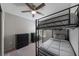 Bedroom features a bunk bed, ceiling fan, and carpeted flooring at 3367 Popcorn Flower St, Las Vegas, NV 89117