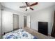 Bedroom with ceiling fan and carpet, providing a comfortable living space at 3367 Popcorn Flower St, Las Vegas, NV 89117