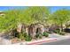 Beautiful exterior of a home with lush green trees providing shade and curb appeal on a sunny day at 3367 Popcorn Flower St, Las Vegas, NV 89117
